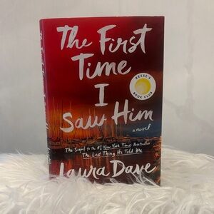 The First Time I Saw Him by Laura Dave - Red Hardcover